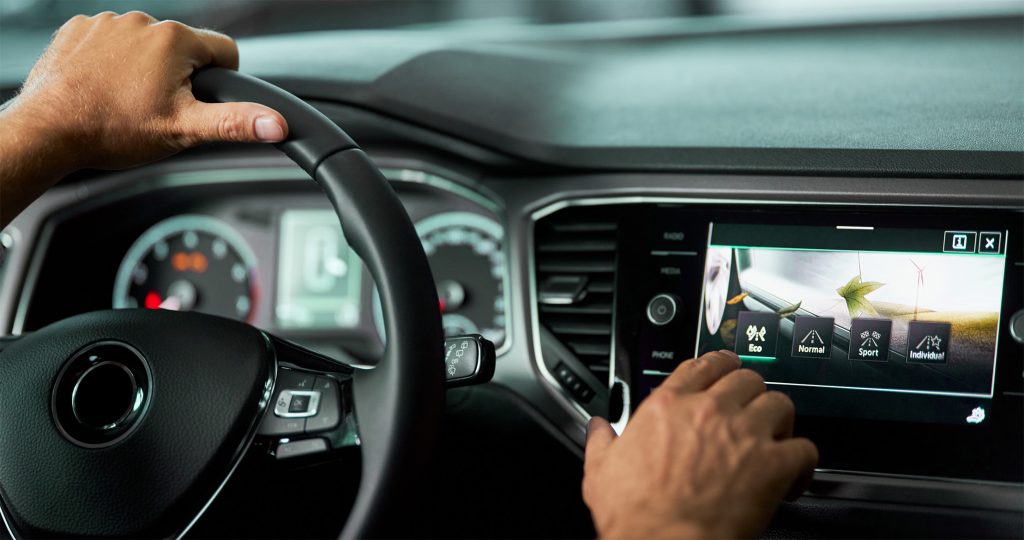 Automotive revenue analytics dashboard showing connected service take-up by market
