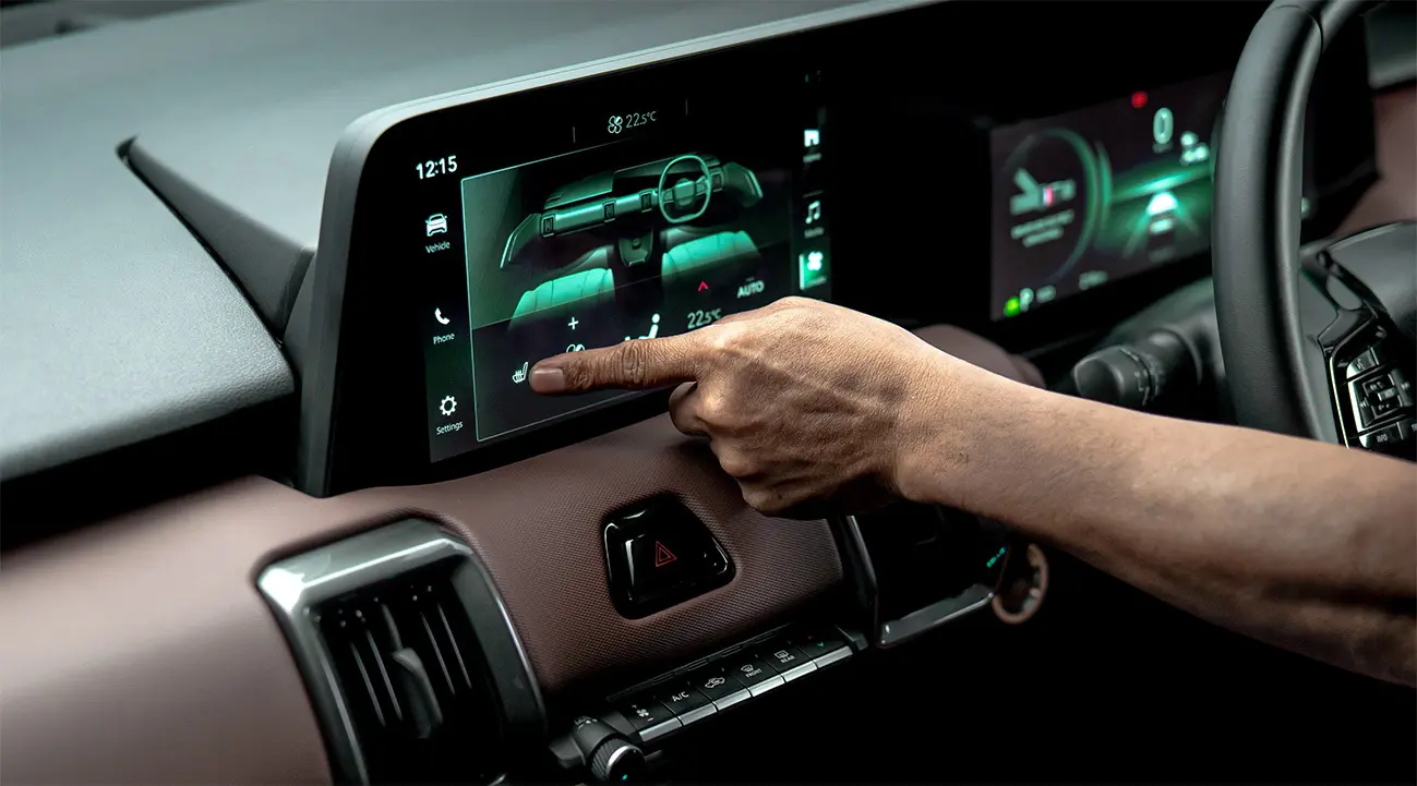 Driver interacting with intelligent vehicle systems on an in-car display