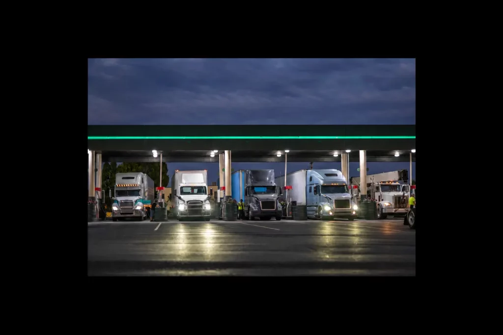 HGV refuelling at a diesel pump, showing the fleet cost of the EU ETS2 diesel price rise